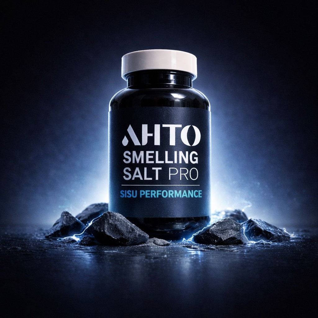 Bottle of 'AHTO Smelling Salt Pro' on a dark background with rocks.